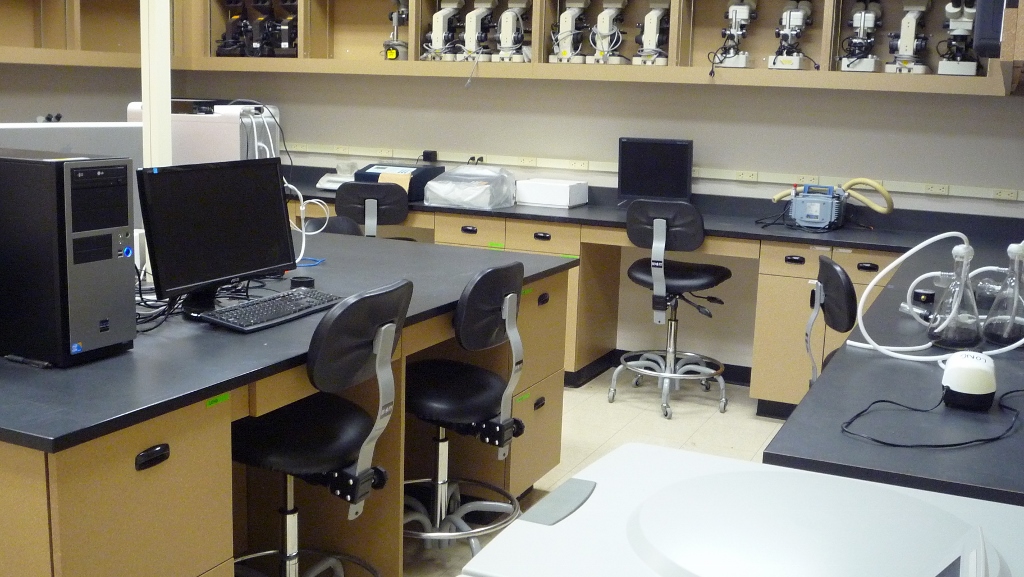 room with computers and microscopes